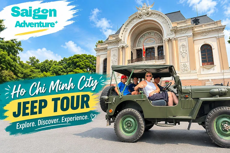 Foreign tourists enjoying a Ho Chi Minh City Jeep Tour through the vibrant streets of Saigon, Vietnam