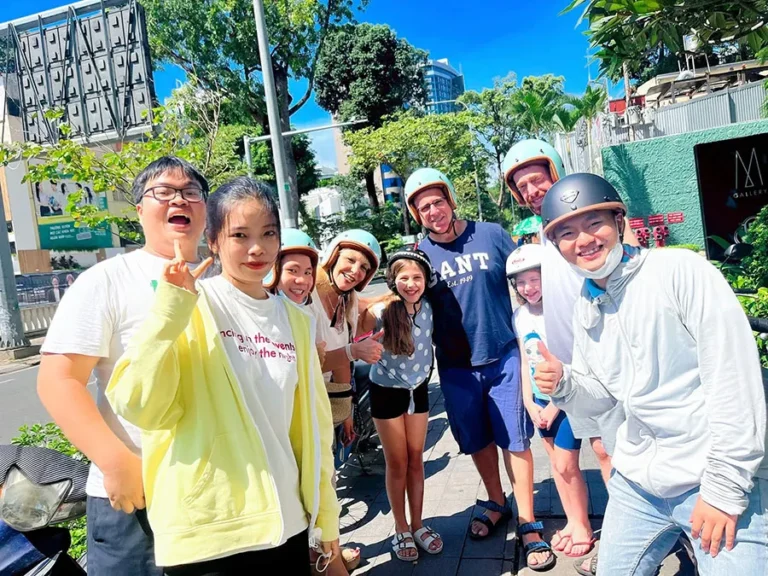 Travelers capture unforgettable memories during an exciting Motorbike Tour through vibrant Ho Chi Minh City.