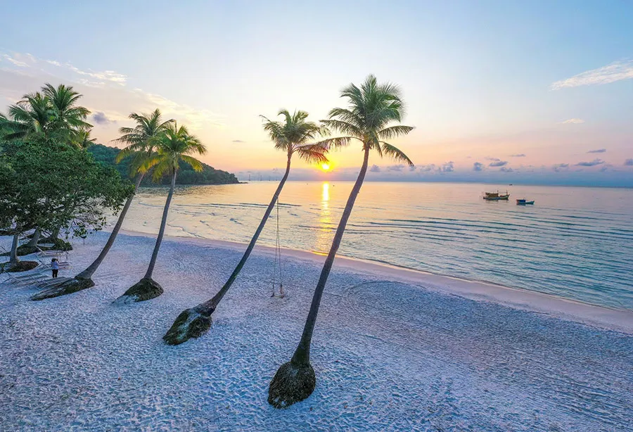 Sao Beach in Phu Quoc with powdery white sand, turquoise water, and tropical palm trees, one of Vietnam's best beaches