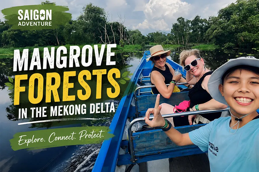 Tourists exploring the mangrove forests in the Mekong Delta by boat with Saigon Adventure