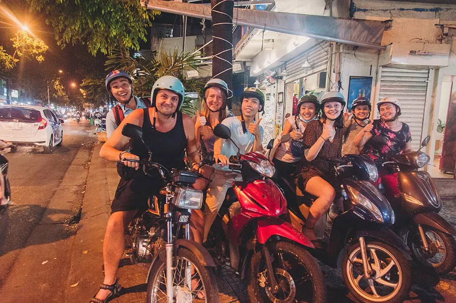 Evening Scooter Food Tour in Ho Chi Minh City 1 Exploring everyday life, local food and hidden streets on a Saigon scooter tour