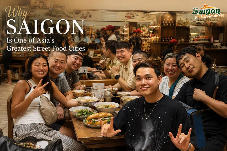 Tourists enjoying authentic Vietnamese street food in Saigon, one of Asia's greatest street food cities