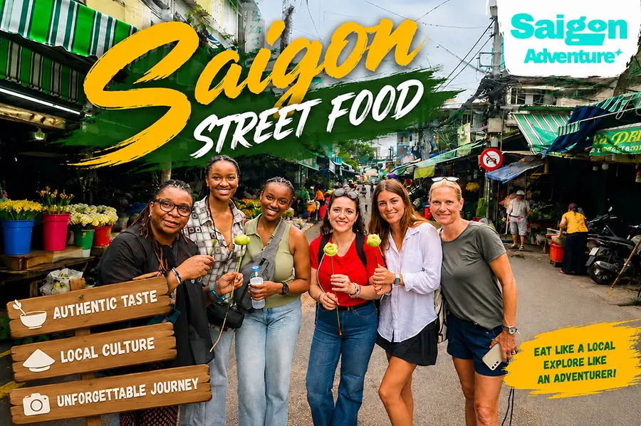 Is a Ho Chi Minh City Food Tour Worth It? 10 Happy tourists enjoying Saigon Street Food experience in a bustling local market street