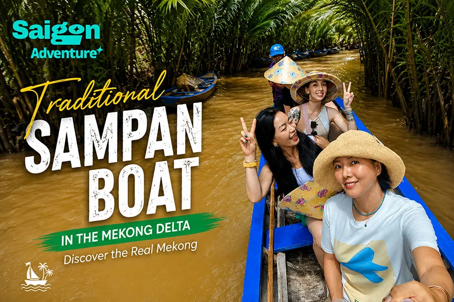 Traditional Sampan Boat in the Mekong Delta: Is It Worth It? Full Guide for First-Time Visitors 3 Traditional Sampan Boat in the Mekong Delta with happy travelers exploring scenic coconut canals on an authentic Vietnam river tour