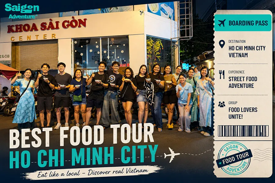 Happy travelers enjoying the best food tour in Ho Chi Minh City with Saigon Adventure.