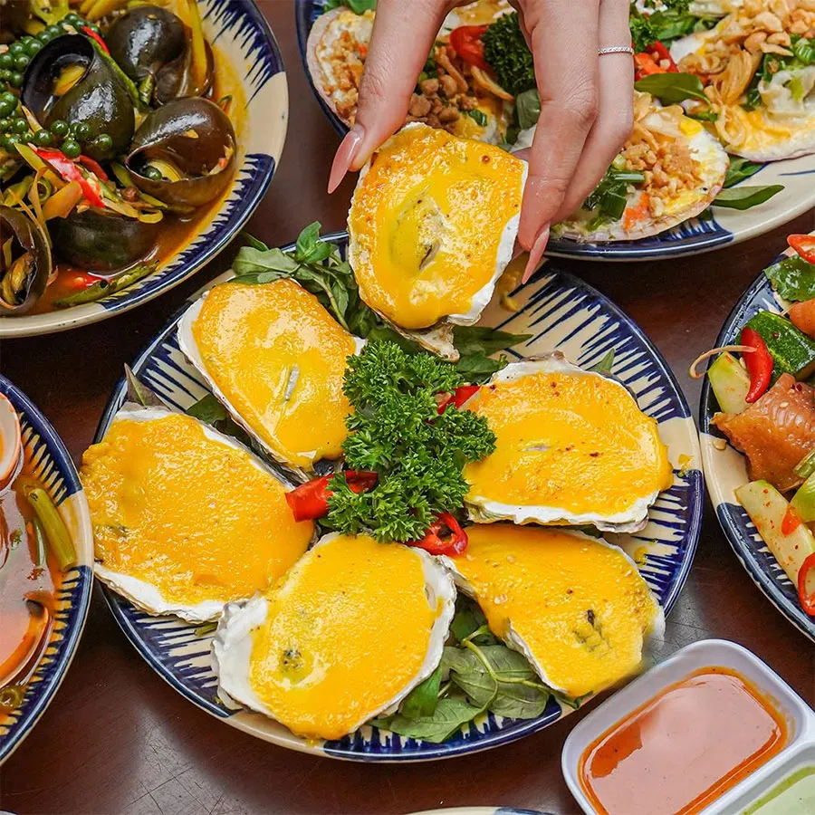 10 Best Vietnamese Snail Dishes to Try in Ho Chi Minh City 7 Try grilled oysters with cheese in Saigon for their creamy topping and naturally sweet seafood flavour