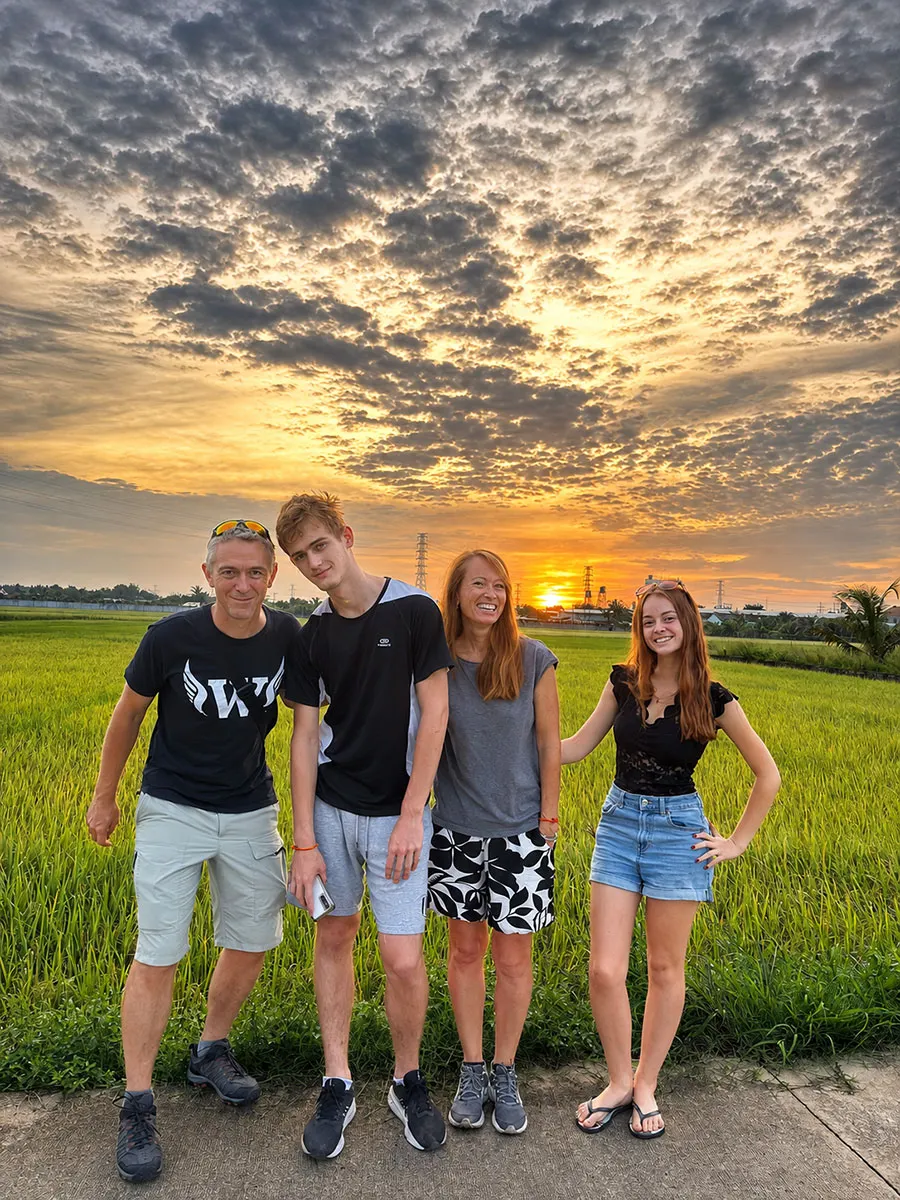 Cai Be, Tien Giang: A quiet Mekong Delta escape from Ho Chi Minh City 3 Travelers enjoying a peaceful countryside experience at sunset in the Mekong Delta.