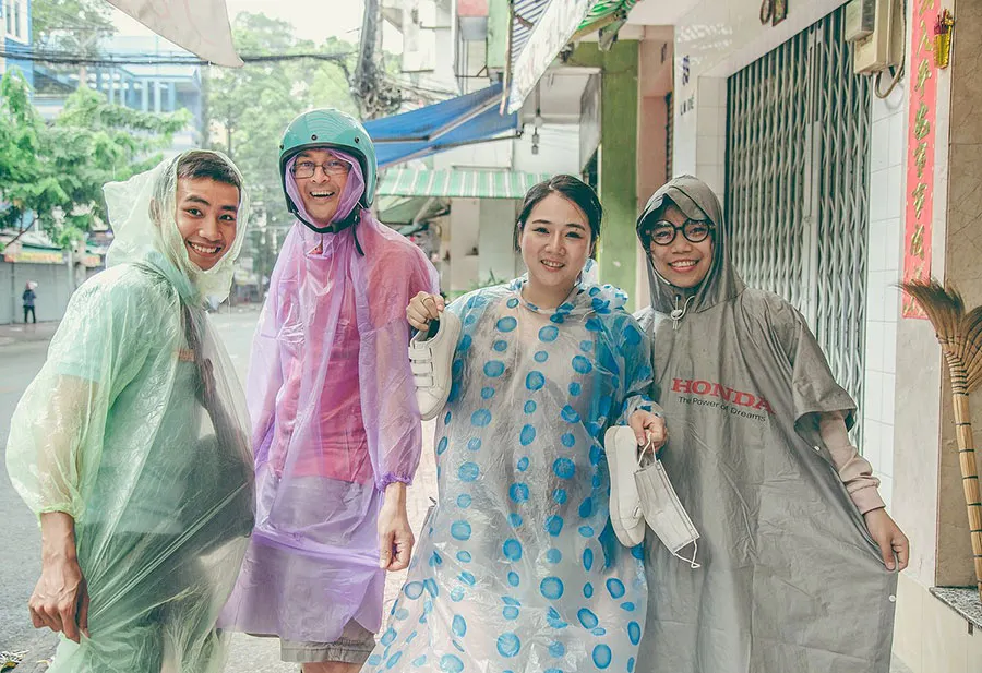 Can You Explore Ho Chi Minh City in the Rain? A Practical Guide for Travelers 1 Ho Chi Minh City rainy season travel with colorful motorbike ponchos