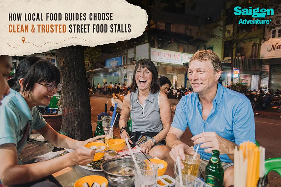 How Local Food Guides Choose Clean and Safe Street Food Vendors 1 Saigon Adventure local guide showing tourists how to choose safe street food vendors