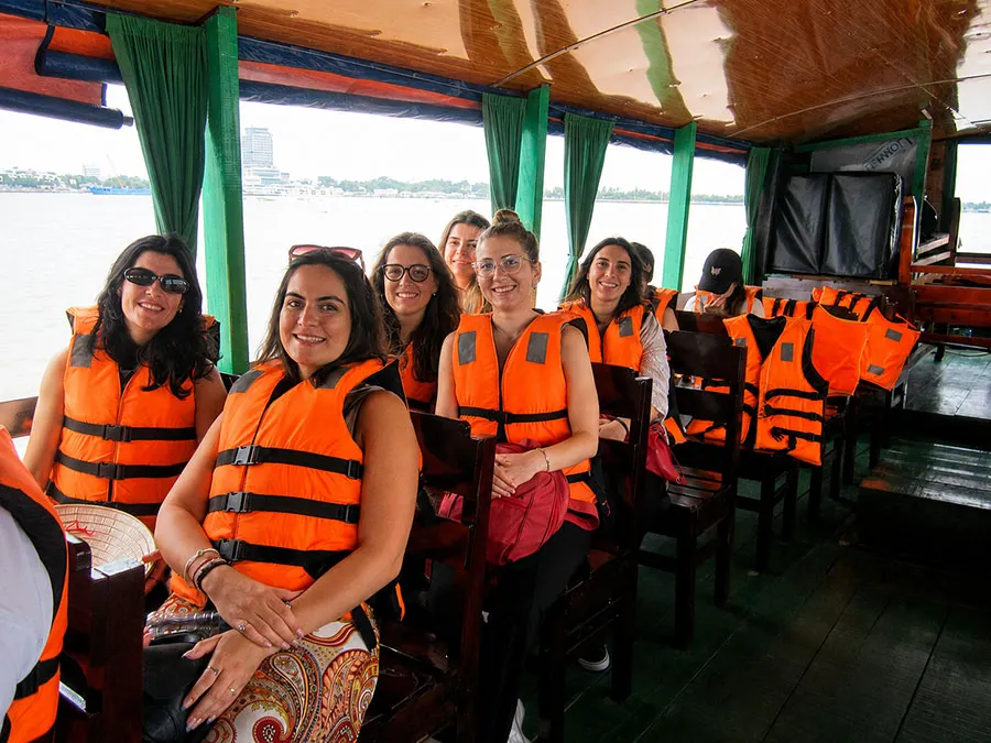 Is the Mekong Delta Safe for Tourists? A Practical Safety Guide 3 Tourists equipped with life jackets on a Mekong Delta boat tour