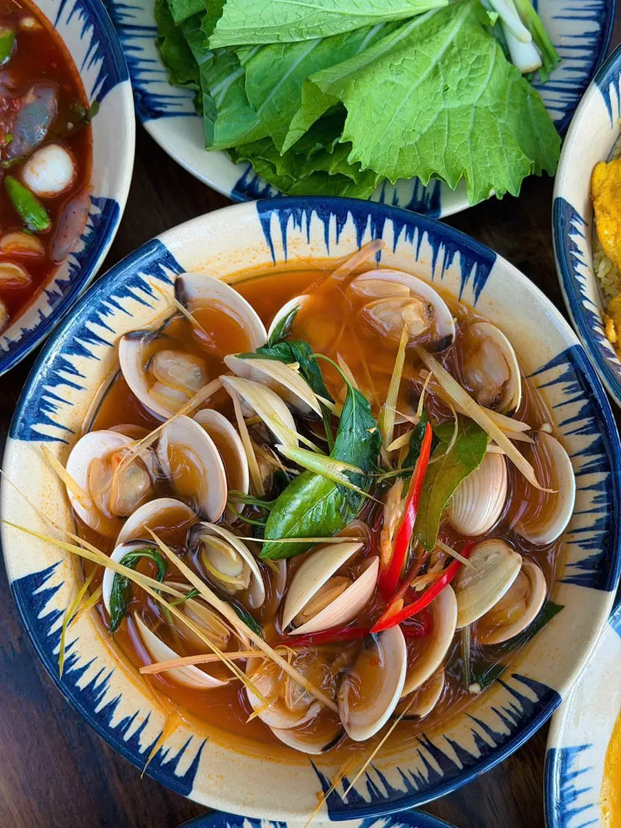 Saigon Seafood Street Food You Shouldn’t Miss 6 Enjoy fragrant lemongrass-steamed clams, featuring tender, naturally sweet meat in a light broth infused with fresh lemongrass and lime.