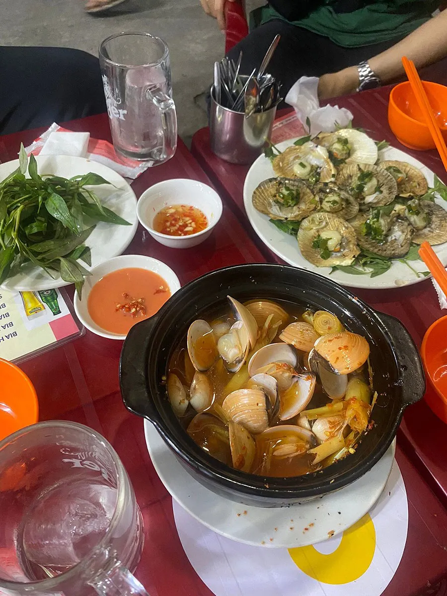 District 4 Food Tour: Explore Saigon’s Paradise for Snails and Street Seafood 2 Add lemongrass-steamed clams to your Vietnam food adventure and discover how comforting local seafood can be.