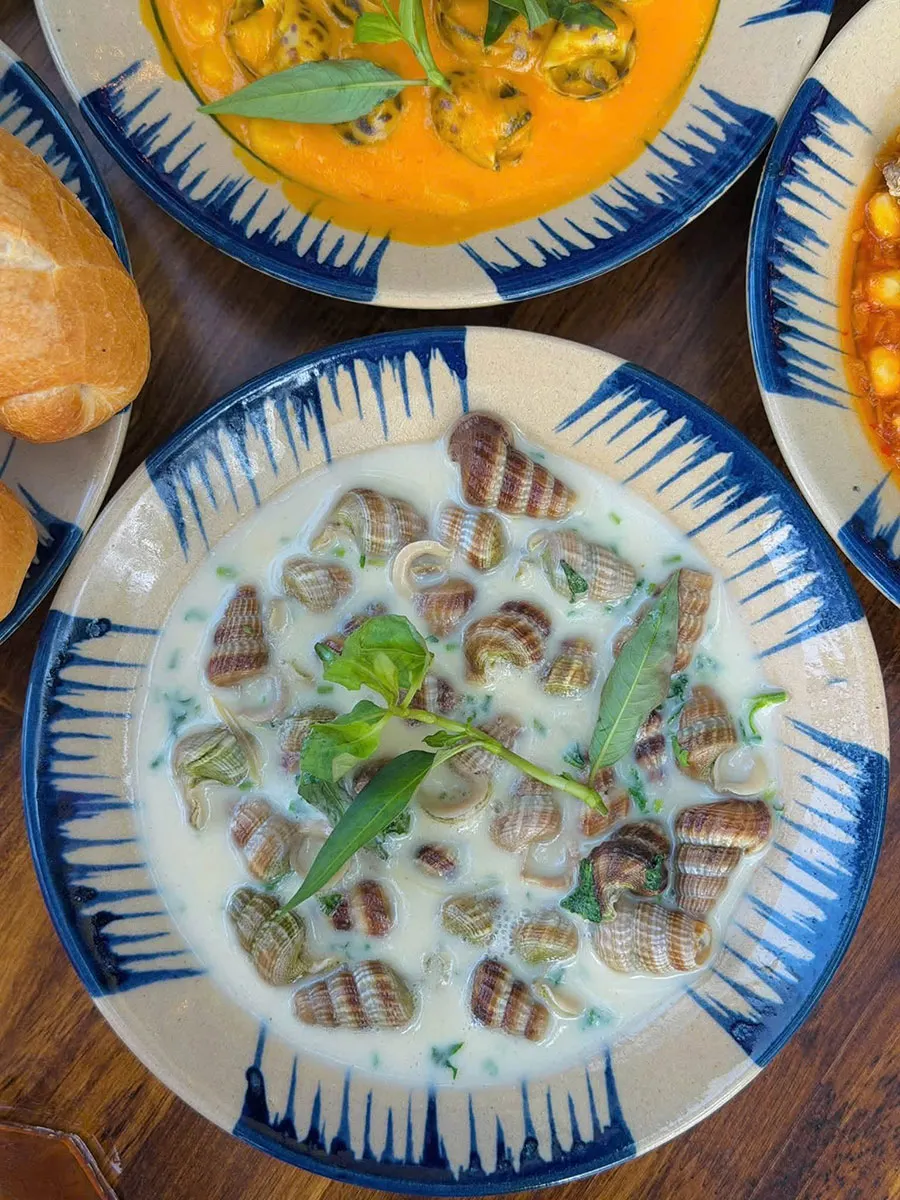 Saigon Seafood Street Food You Shouldn’t Miss 3 Try creamy coconut stir-fried snails for an authentic taste of Saigon