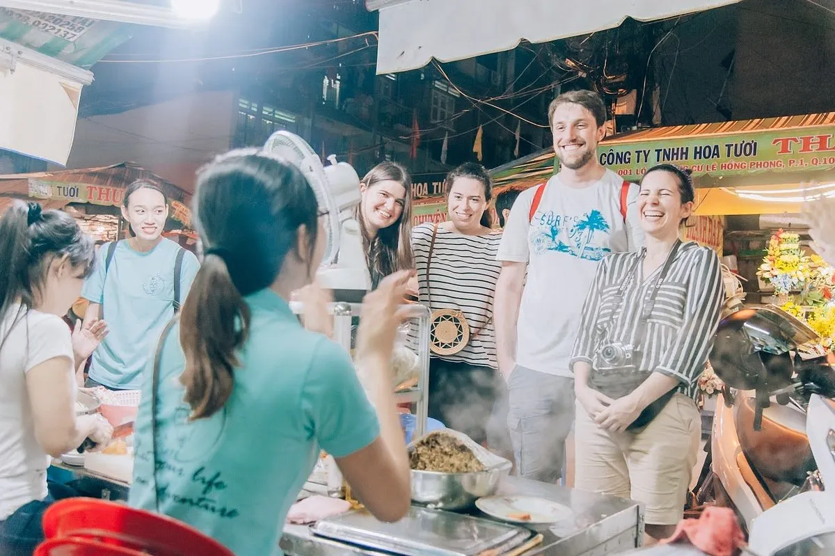 Saigon Sightseeing and Street Food in One Evening: A 4-Hour Itinerary 1 Explore Saigon after dark with iconic landmarks, lively streets and delicious local street food.