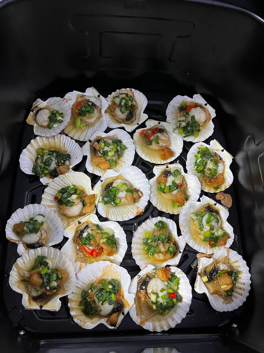 Saigon Seafood Street Food You Shouldn’t Miss 4 Grilled scallops with spring onion oil and peanuts in Saigon