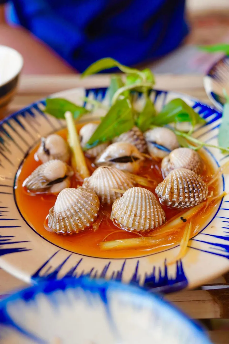 Saigon Seafood Street Food You Shouldn’t Miss 5 Enjoy flavorful tamarind blood cockles at a Saigon seafood stall
