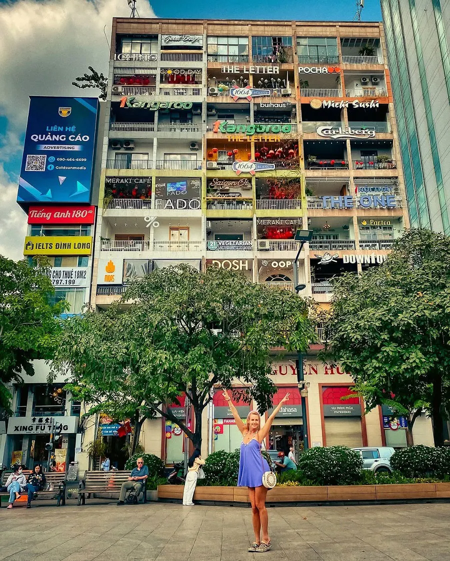Saigon Old Apartment Buildings: A Walking Guide to Hidden City Life 3 The Cafe Apartment at 42 Nguyen Hue, one of the most unique places to explore in District 1.