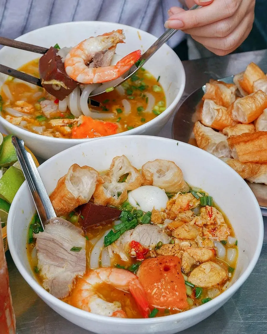 Best Vietnamese Noodle Soups in Ho Chi Minh City Besides Pho 4 Experience Saigon street food with a colourful bowl of bánh canh cua