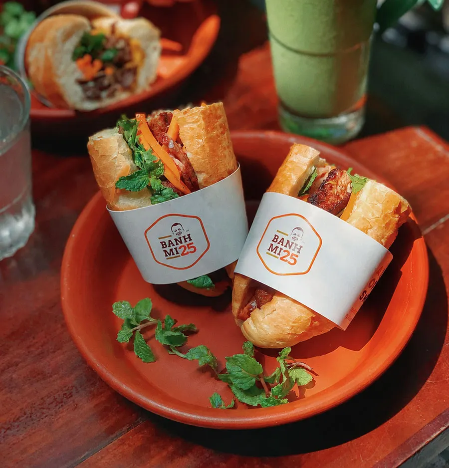 Hanoi Train Street Food Guide: What to Eat and Drink Near the Railway 6 Try a crispy Vietnamese bánh mì while enjoying the atmosphere of Hanoi Train Street.