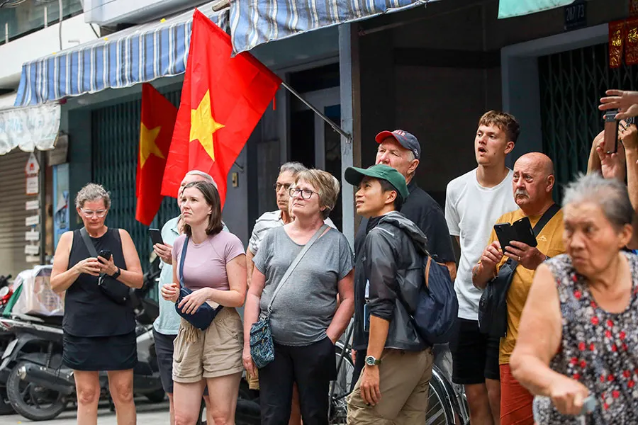District 7 Travel Guide: A Different Side of Ho Chi Minh City 1 A cheerful group of tourists discovering a different side of Saigon