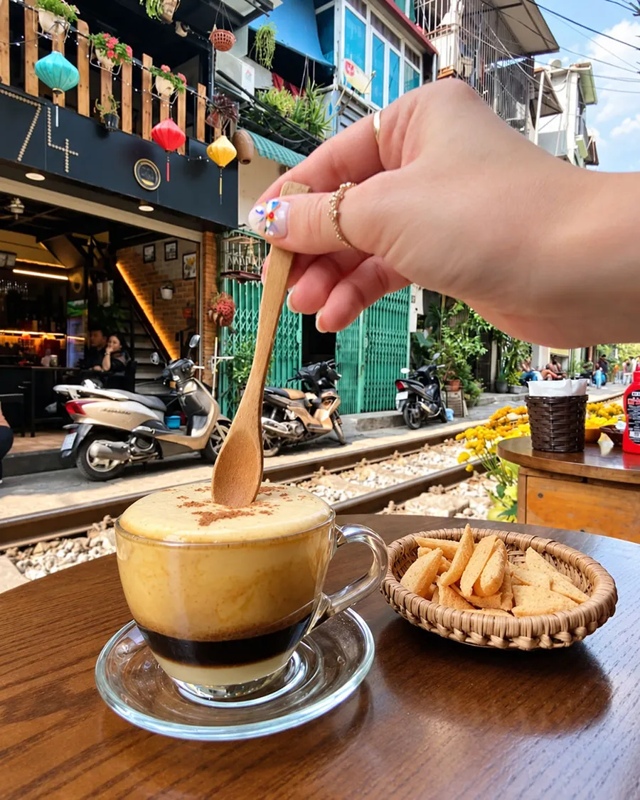 Hanoi Train Street Food Guide: What to Eat and Drink Near the Railway 3 Discover the rich and creamy flavor of Hanoi egg coffee beside the famous railway.
