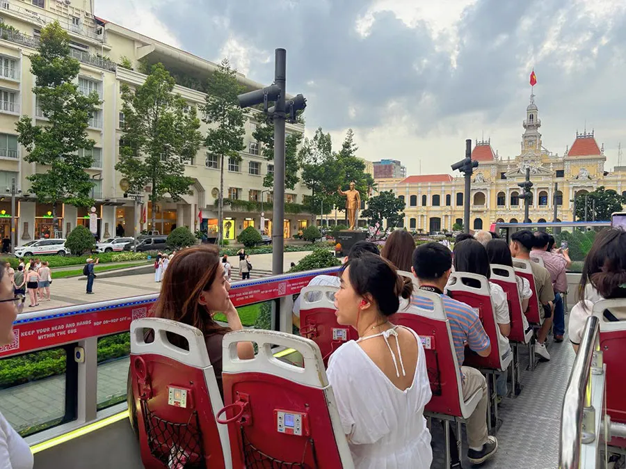 Is the Ho Chi Minh City Hop-On Hop-Off Bus Worth It? 2 Saigon Hop-On Hop-Off Bus passing famous city landmarks