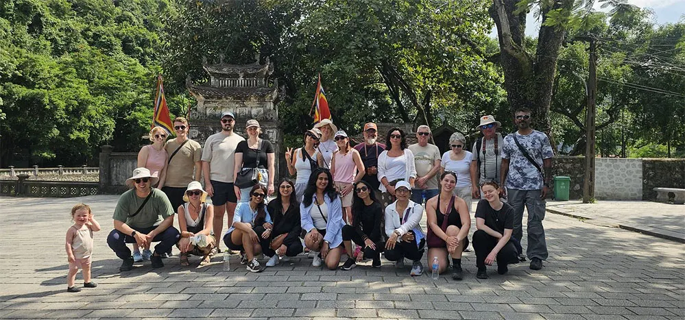 Hoa Lu Ancient Capital Guide: History, Temples and Travel Tips 1 Visitors enjoying a heritage sightseeing experience at Hoa Lu Ancient Capital, Ninh Binh