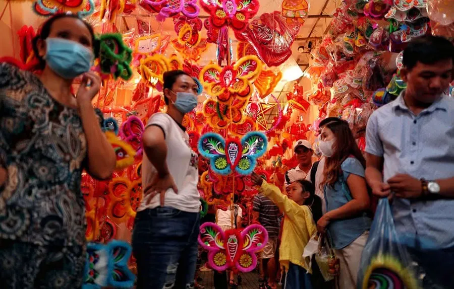 Where to See Mid-Autumn Lanterns in Ho Chi Minh City 3 A festive Saigon street lined with colorful traditional lantern stalls
