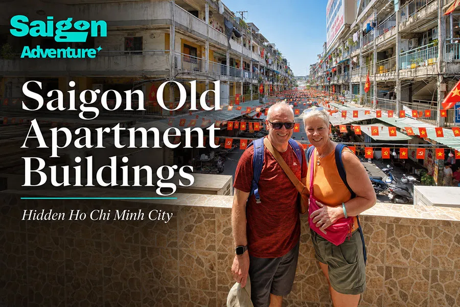 Saigon Old Apartment Buildings: A Walking Guide to Hidden City Life 7 International tourists exploring a unique old apartment area in Saigon