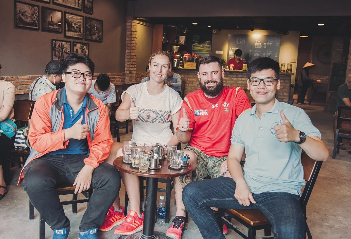 Sidewalk Coffee in Ho Chi Minh City: A Local Guide to Saigon’s Street Café Culture 2 Travelers enjoying a local morning coffee experience in Ho Chi Minh City