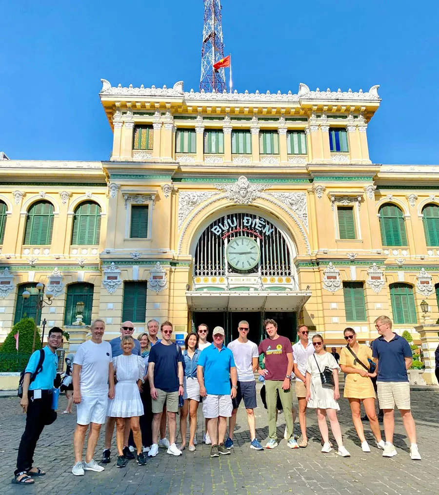 What to Do in Saigon If You’re Not Interested in Museums 2 Travelers exploring and taking photos around Saigon Central Post Office