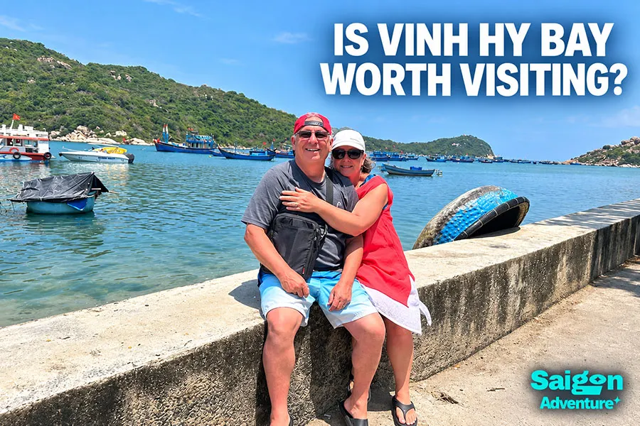 Vinh Hy Bay Travel Guide: Beaches, Coral and Scenic Coastal Roads 2 Scenic Vinh Hy Bay offering a peaceful alternative to busy beach resorts with mountains, boats and clear coastal water