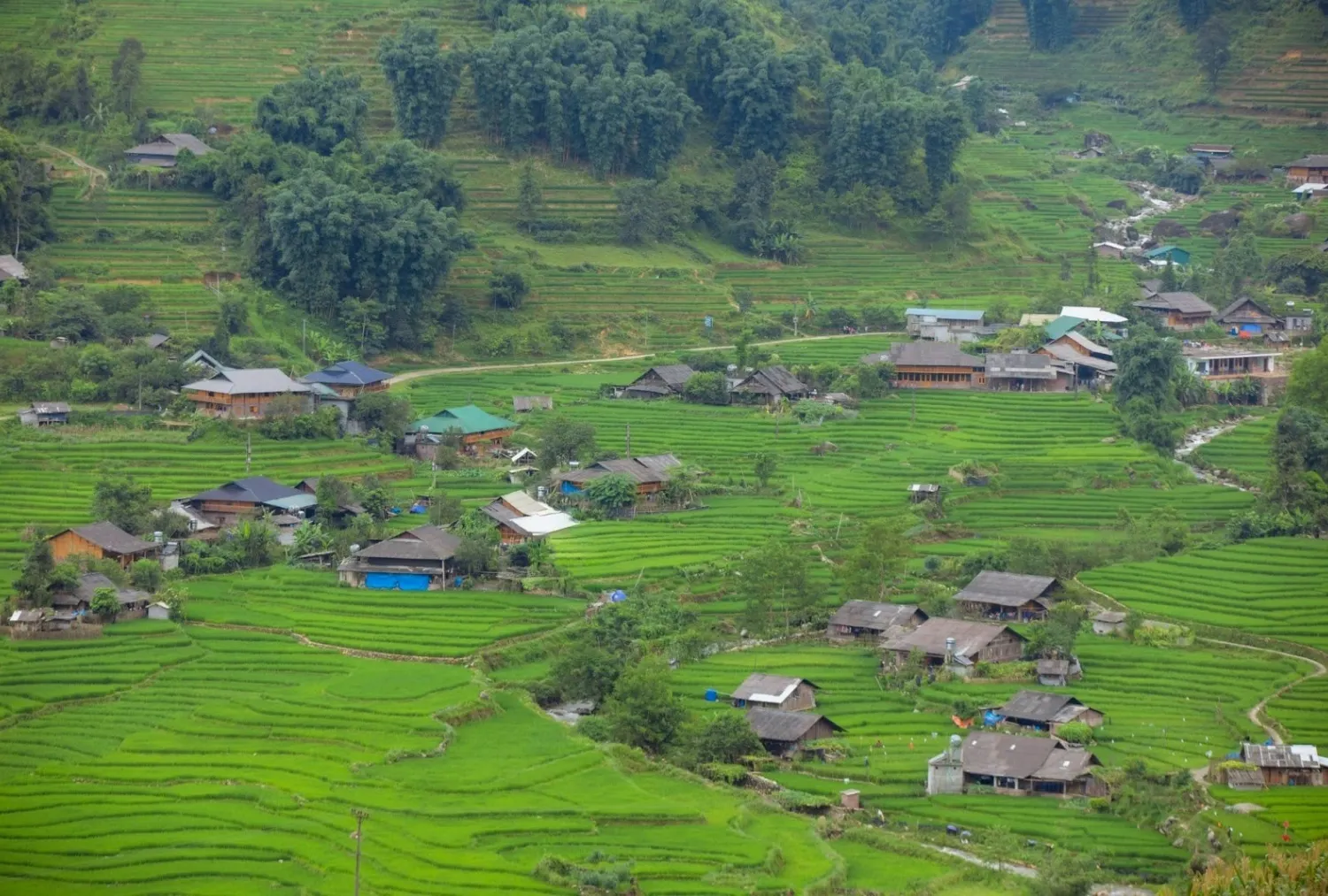 Traditional village landscape surrounded by rice terraces in Sa Pa