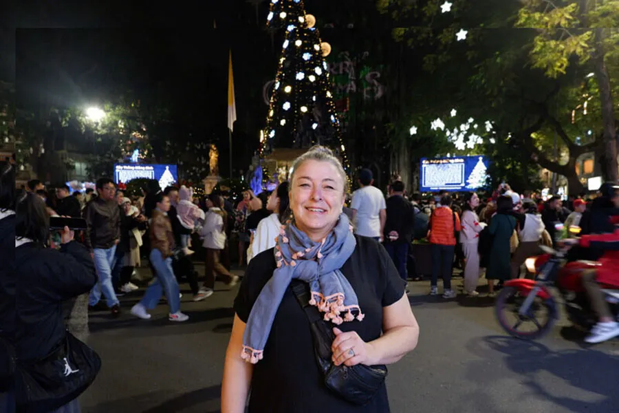 Christmas in Ho Chi Minh City: A first-time visitor’s guide 5 Visitors enjoying a festive evening on Nguyen Hue Walking Street in Ho Chi Minh City