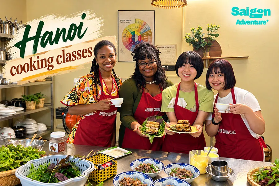 Hanoi cooking classes: What you cook and how to choose 1 International travellers learning to wrap spring rolls during a Hanoi cooking class