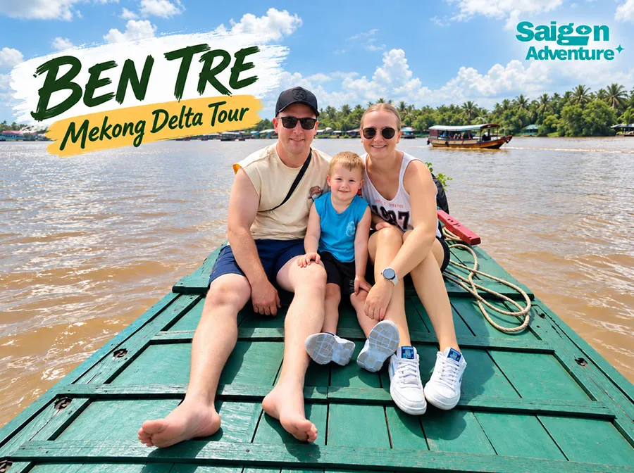 Is Ben Tre Worth Visiting? What to Expect Beyond the Coconut Trees 6 Discovering rural Ben Tre from a traditional Vietnamese wooden sampan