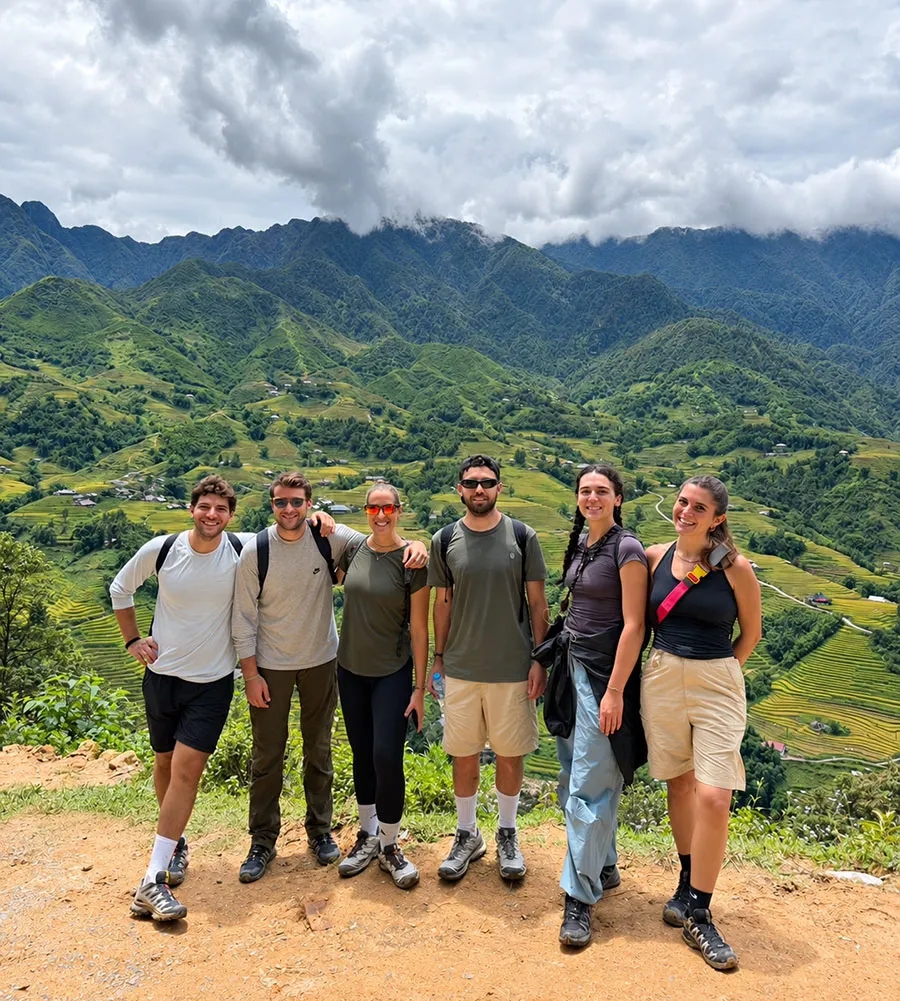 Is Sapa Worth Visiting? An Honest Guide for First-Timers 4 Mountain scenery and terraced fields surrounding a village in Sapa
