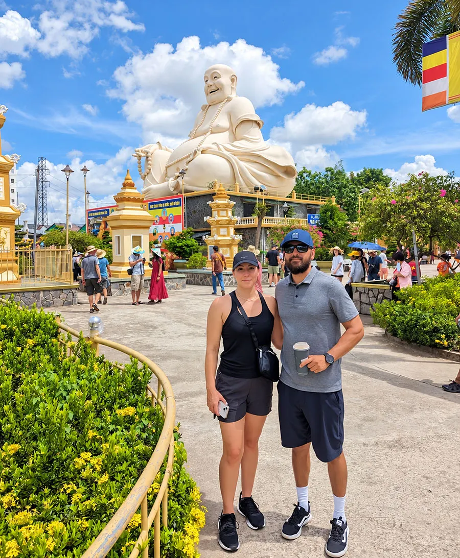 Things to Do in My Tho Beyond the Typical Mekong Tour 3 Giant Laughing Buddha statue at Vinh Trang Pagoda, one of the top attractions in My Tho.