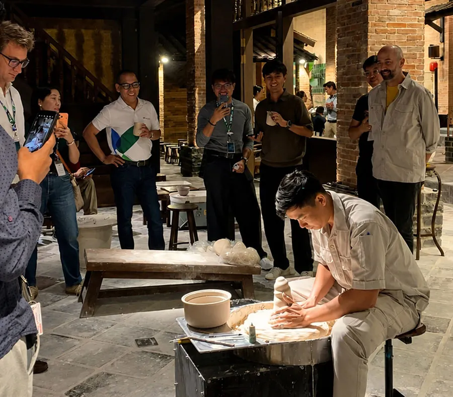 Where to Experience Vietnamese Traditional Crafts in Ho Chi Minh City 4 Visitors exploring traditional Vietnamese pottery at Minh Long Ceramics and Porcelain Museum