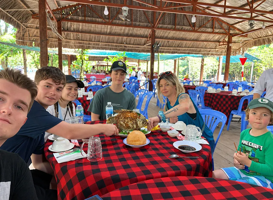 What to Eat in Ben Tre: 8 Local Foods Beyond Candy 7 Delicious Mekong Delta lunch with fried elephant-ear fish and fresh local vegetables