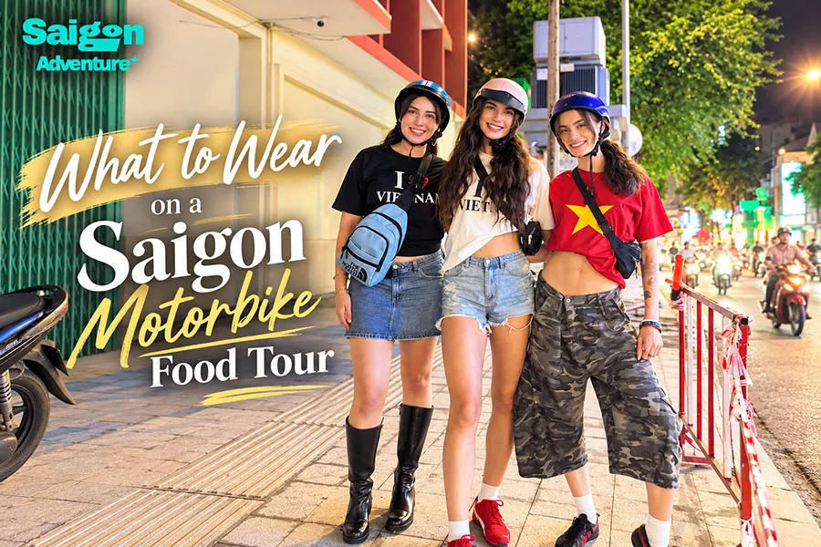 What to Wear on a Saigon Motorbike Food Tour 3 Saigon Adventure guests wearing helmets and breathable clothing while riding through Ho Chi Minh City