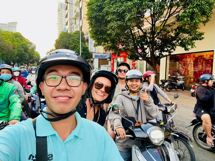 What to Wear on a Saigon Motorbike Food Tour 1 Tourists wearing comfortable outfits for a Saigon motorbike food tour